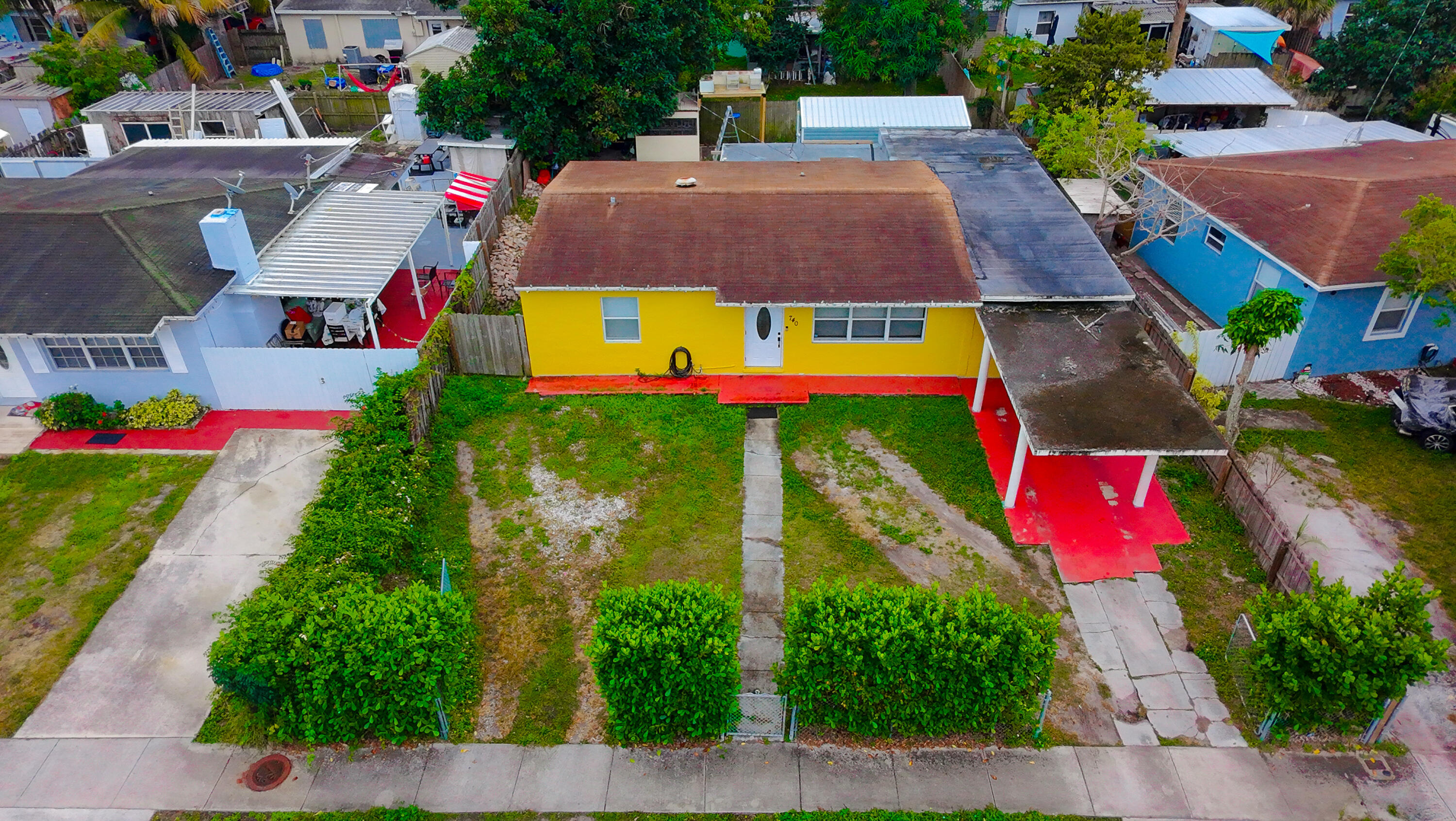 740 Aspen Road West Palm Beach, FL 33409 - Photo 29 of 34 an aerial view of residential houses with yard