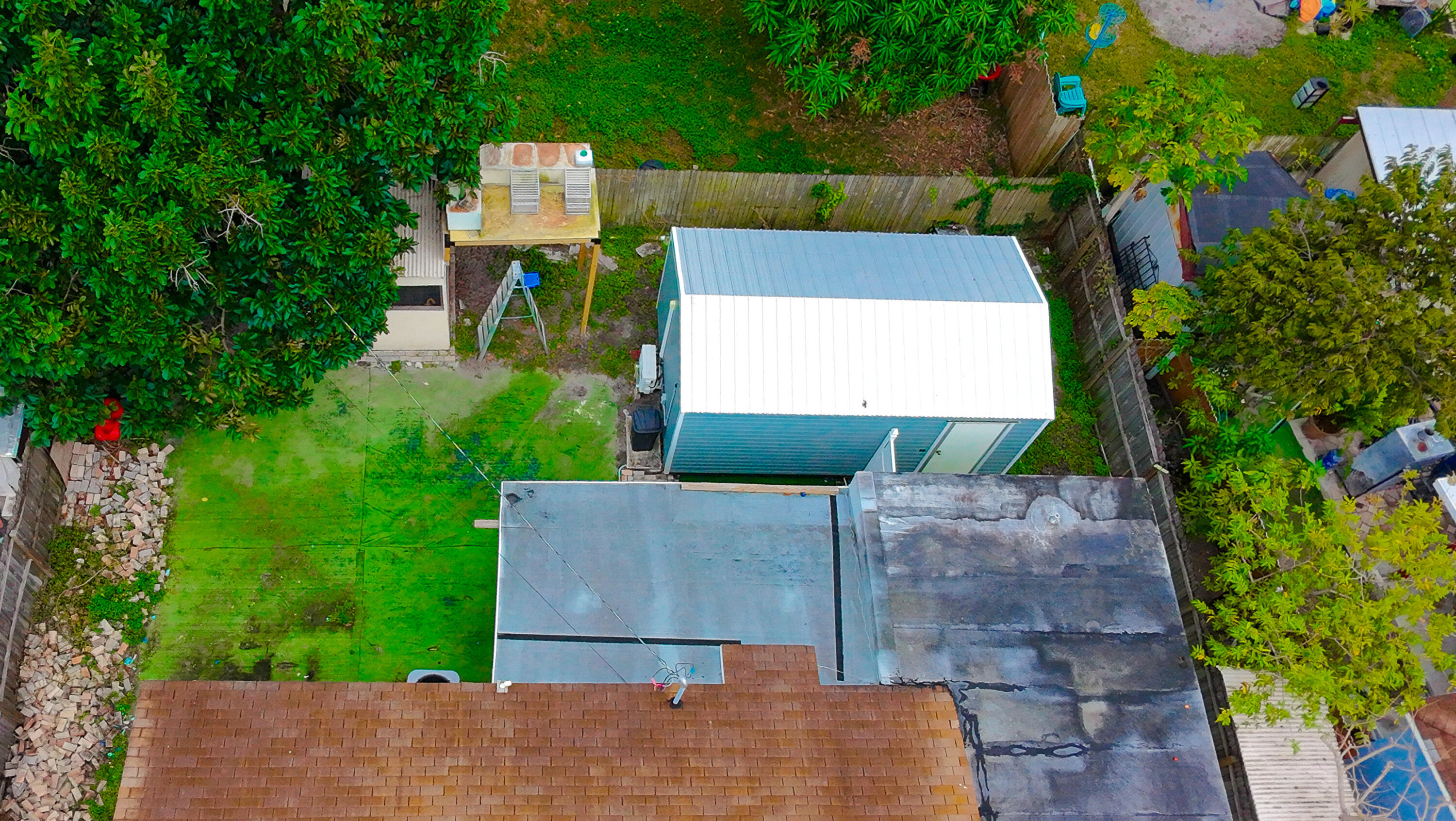 740 Aspen Road West Palm Beach, FL 33409 - Photo 33 of 34 an aerial view of a house with a yard