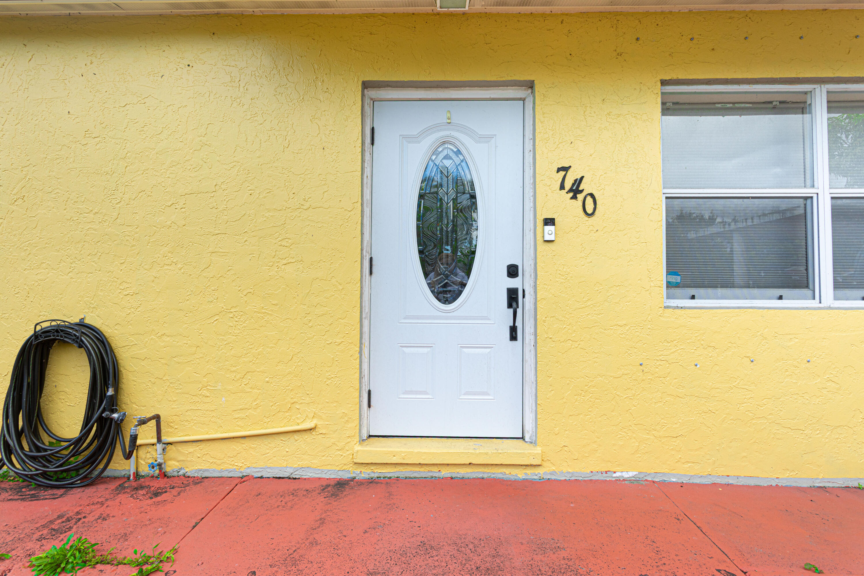740 Aspen Road West Palm Beach, FL 33409 - Photo 8 of 34 a picture of a door of a house