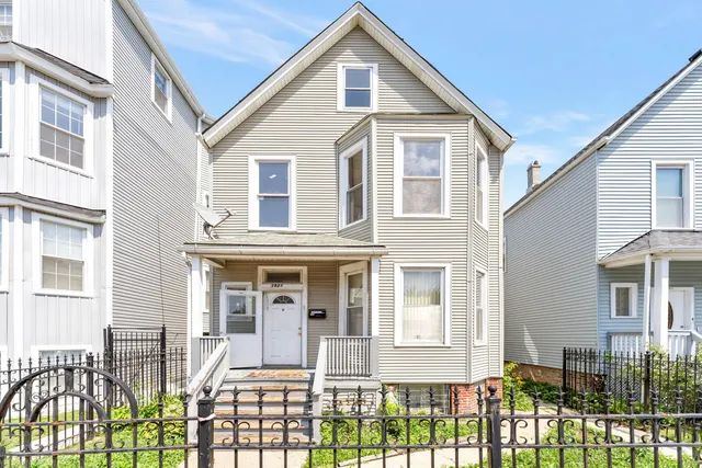 a front view of a house with a porch