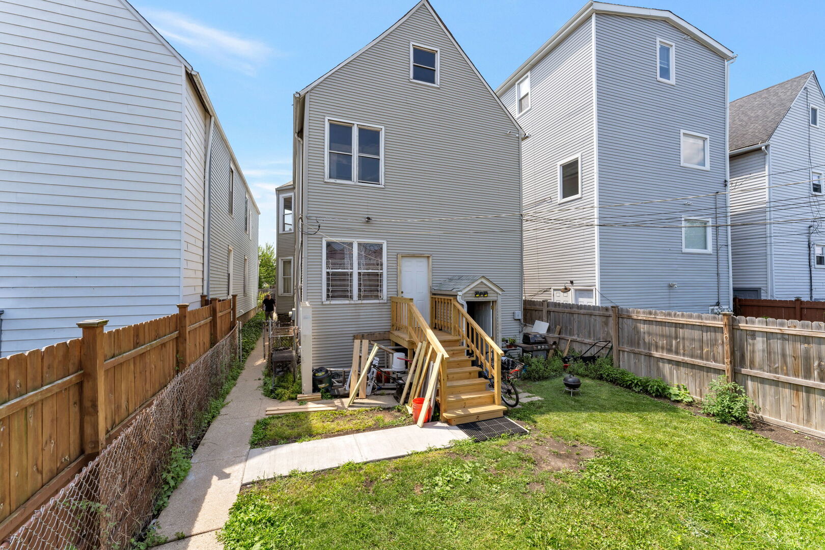 1921 North Pulaski Road, Unit 2 Chicago, IL 60639 - Photo 15 of 15 a view of a house with backyard