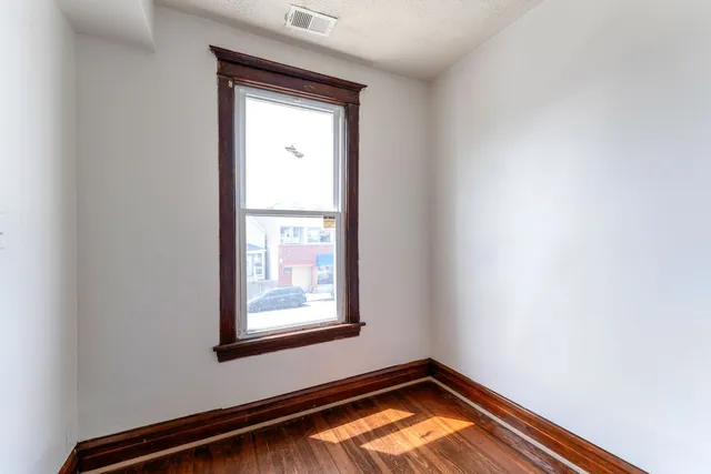 an empty room with window