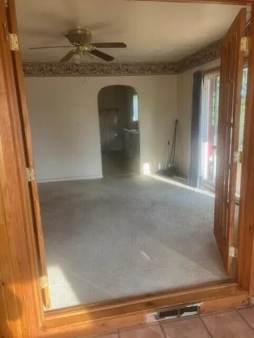 a view of hallway with shower