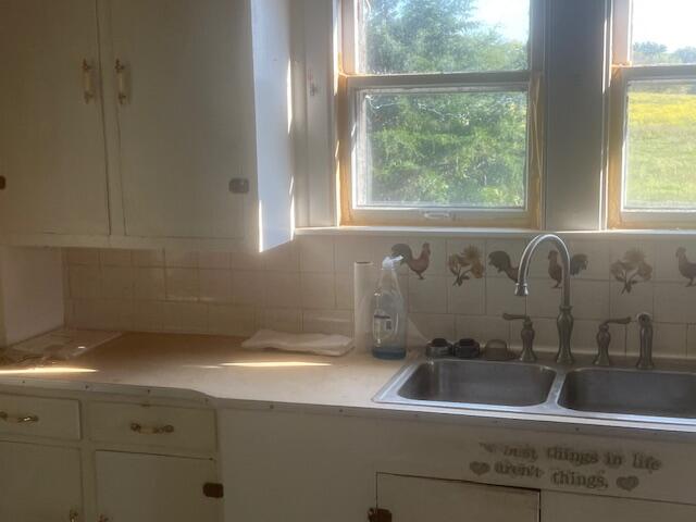 6840 South 250 West North Judson, IN 46366 - Photo 4 of 16 a kitchen with a sink and a window
