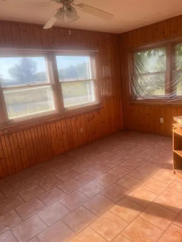 an empty room with windows