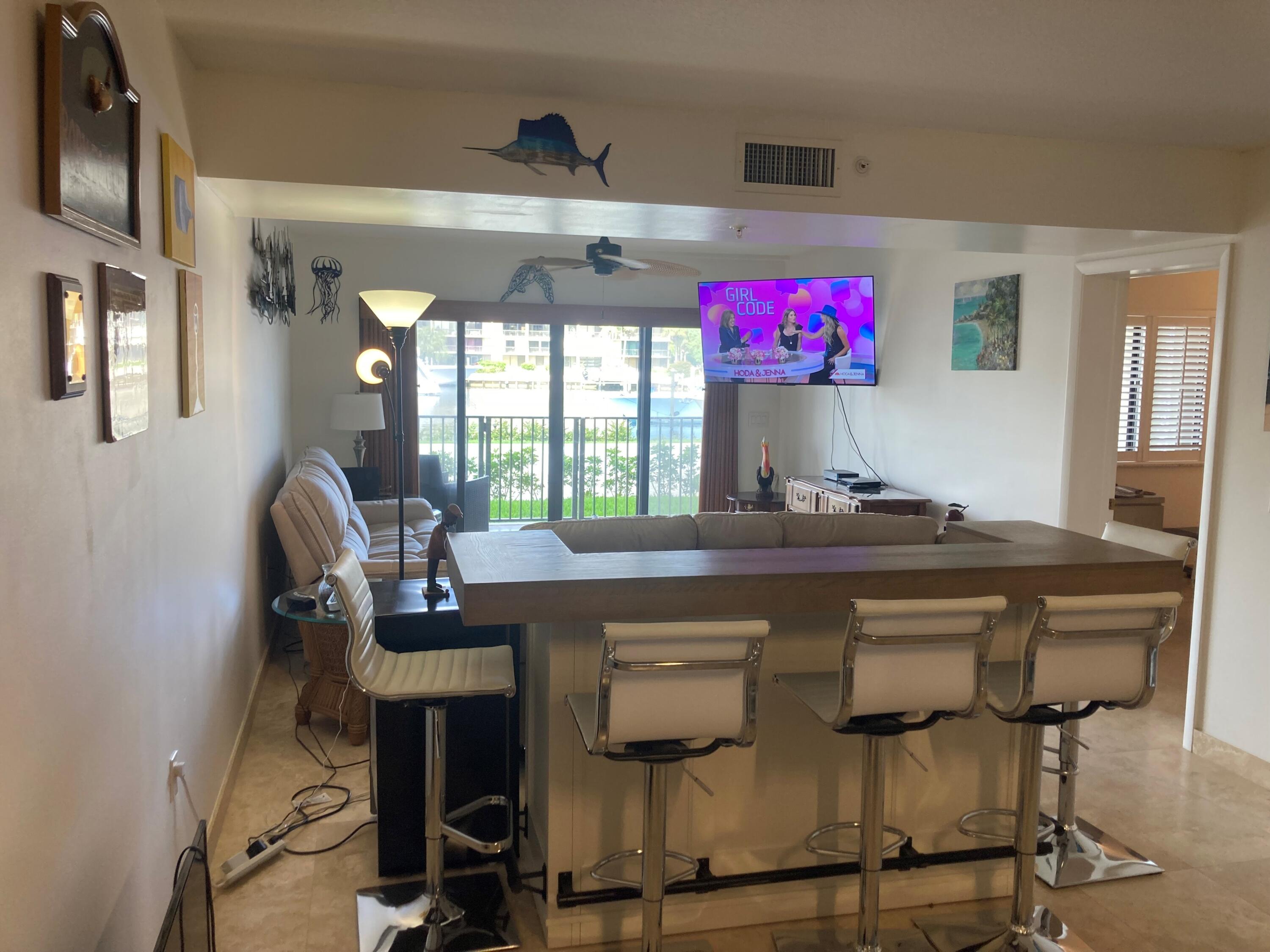 1401 Tidal Pointe Boulevard, Unit 102 Jupiter, FL 33477 - Photo 3 of 20 1401 marina 102 lr bar