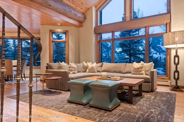 a outdoor living space with furniture and a fireplace