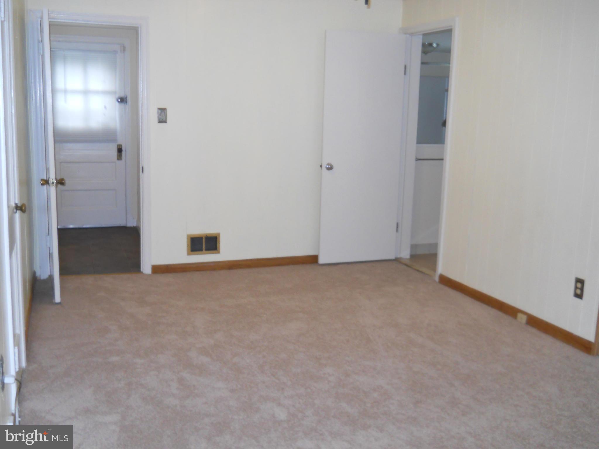 11713 Lytle Street Silver Spring, MD 20902 - Photo 17 of 30 Hall from Family Room leading to side yard Patio