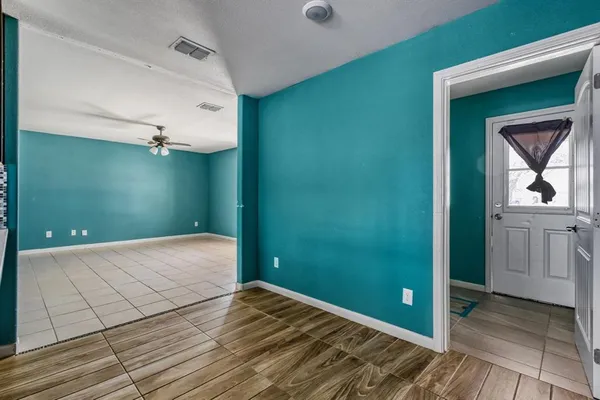 a bedroom with a bed and a sink