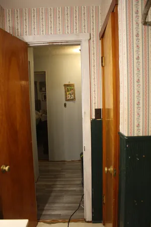 a living room with furniture and a gate