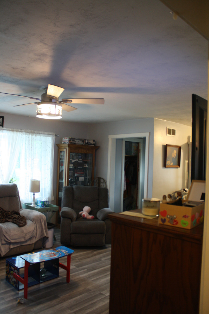1 Elm Drive Bethany, IL 61914 - Photo 22 of 37 a living room with furniture and wooden floor