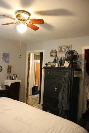 a view of living room with furniture and entryway