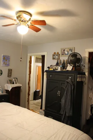 a view of living room with furniture and entryway