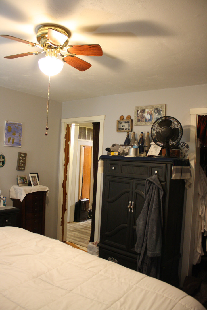 1 Elm Drive Bethany, IL 61914 - Photo 30 of 37 a bedroom with a bed and a mirror