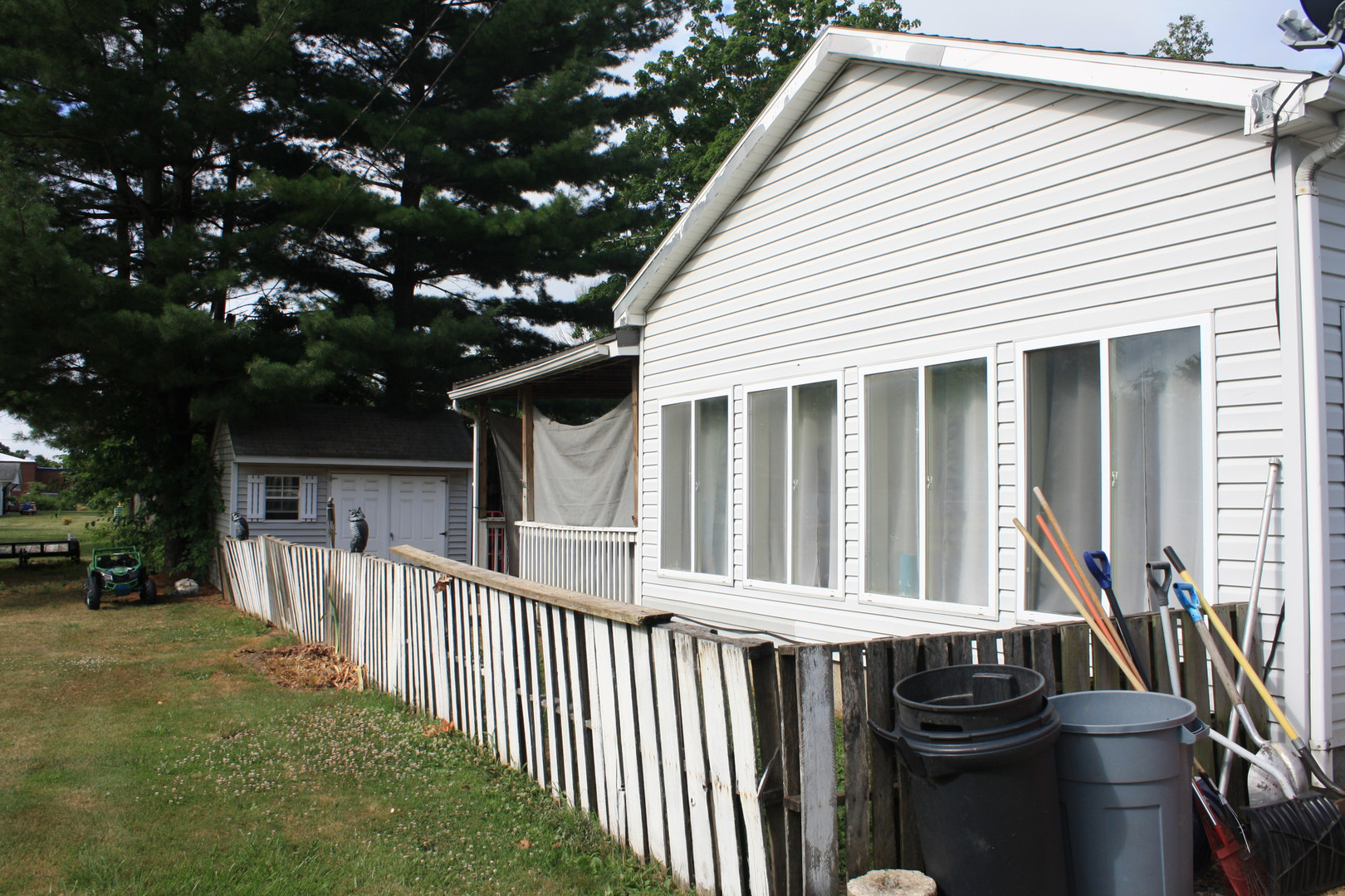 1 Elm Drive Bethany, IL 61914 - Photo 3 of 37 a view of a house with backyard and deck