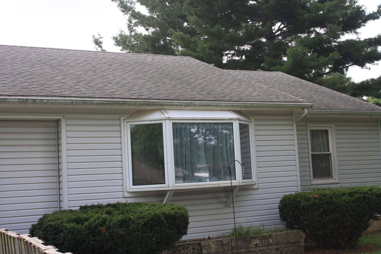 1 Elm Drive Bethany, IL 61914 - Photo 4 of 37 a front view of a house with a garden