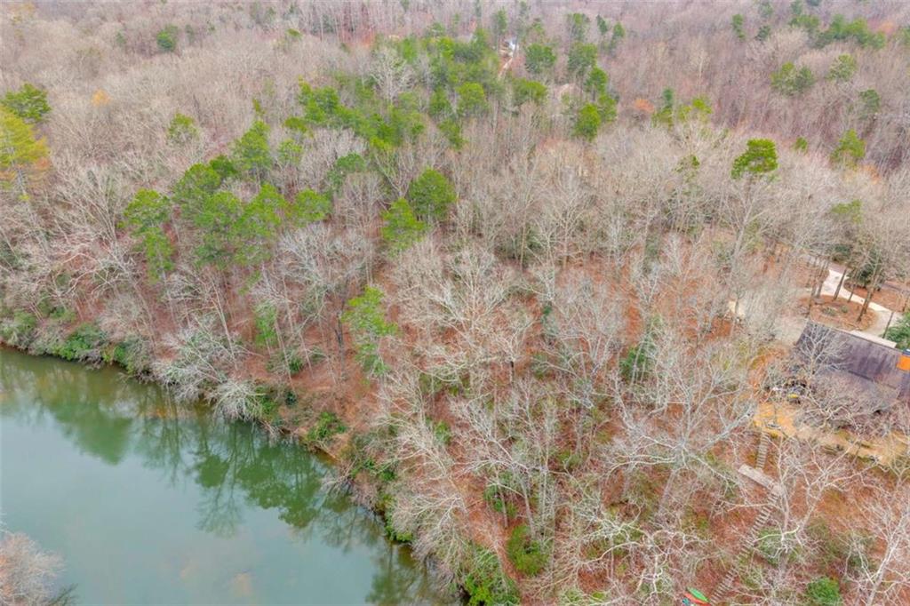 Lot 15 Old Timber Trail Cornelia, GA 30531 - Photo 11 of 31 a view of a lake with a yard