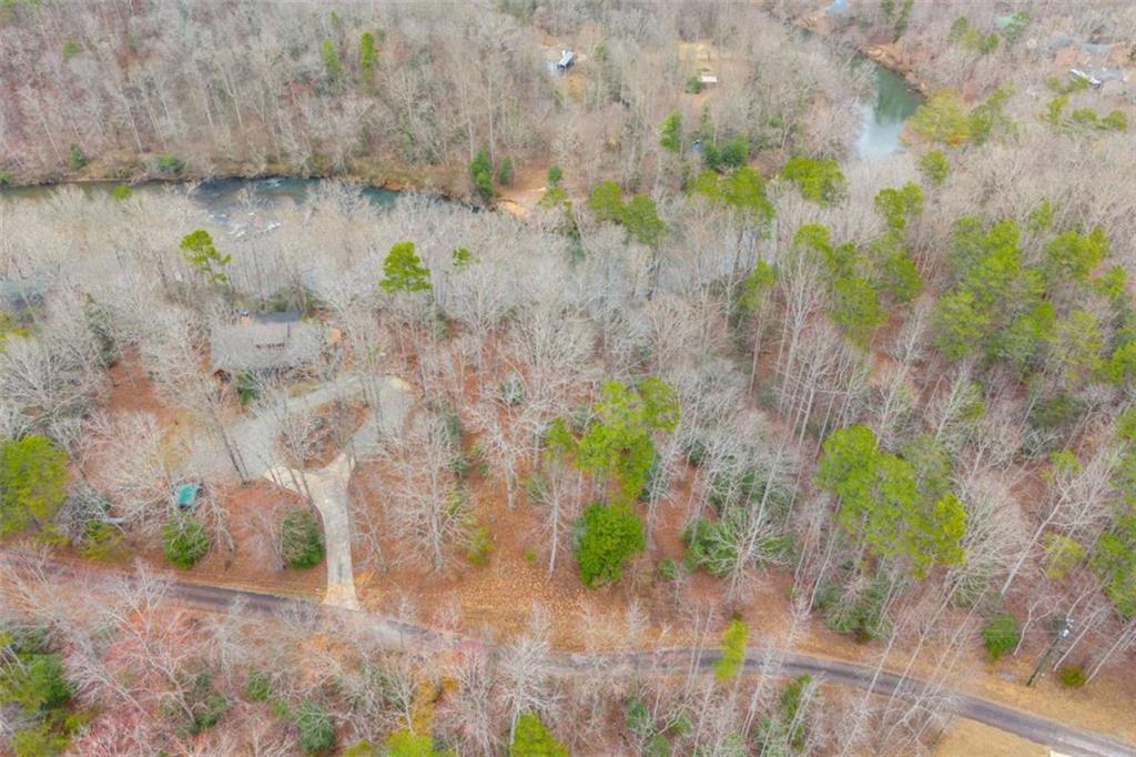 Lot 15 Old Timber Trail Cornelia, GA 30531 - Photo 15 of 31 a backyard of a house with lots of green space
