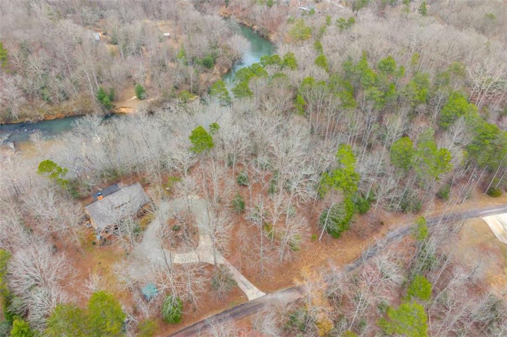 Lot 15 Old Timber Trail Cornelia, GA 30531 - Photo 16 of 31 a view of a yard with wooden floor