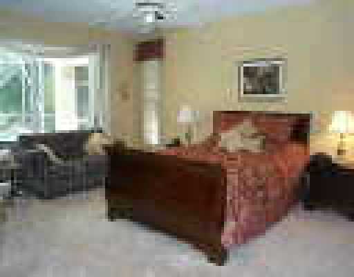 121 Victorian Lane Jupiter, FL 33458 - Photo 6 of 11 a room with furniture and windows