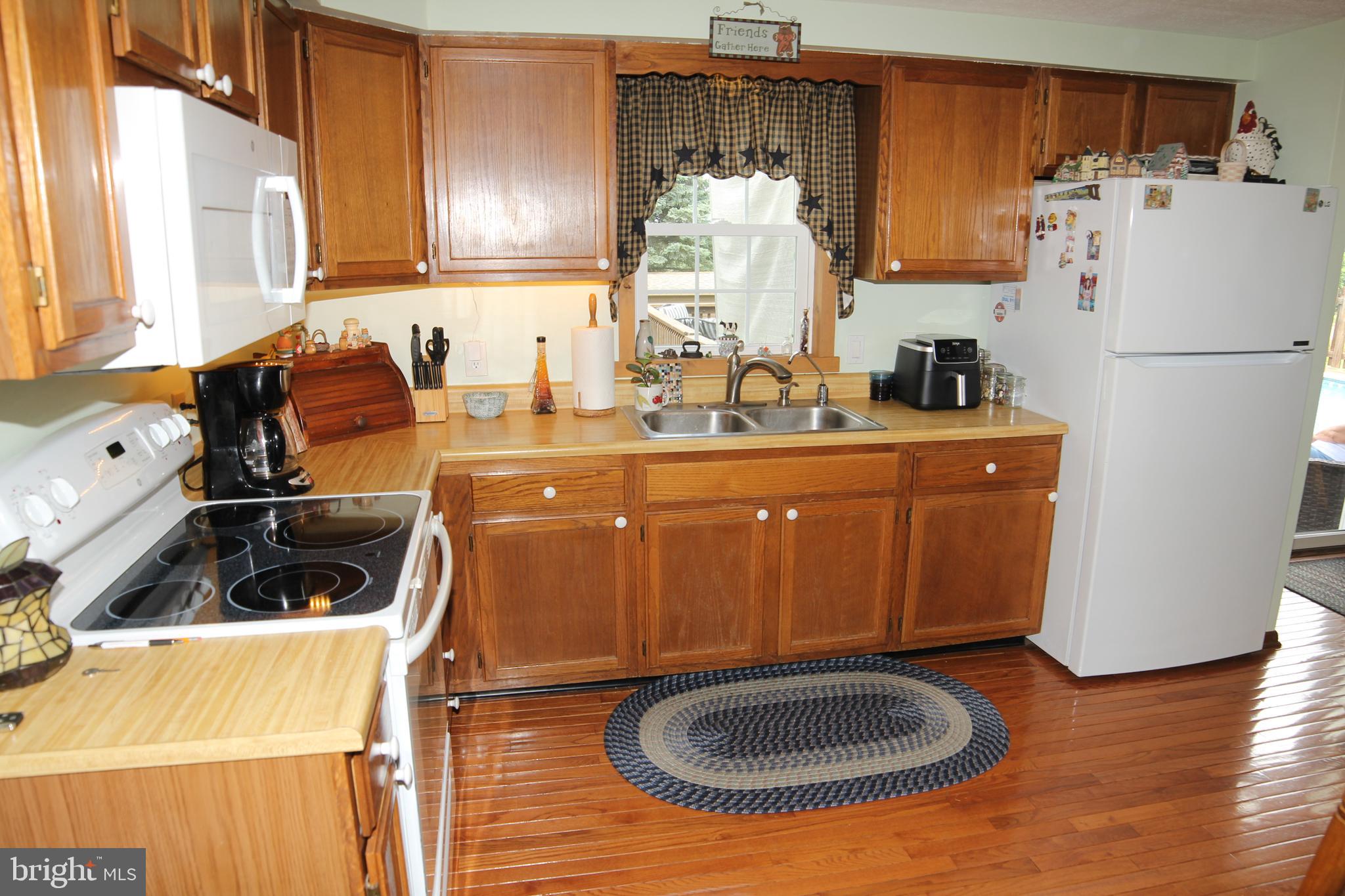 2718 Furnace Road Felton, PA 17322 - Photo 18 of 51 a kitchen with a refrigerator sink and stove