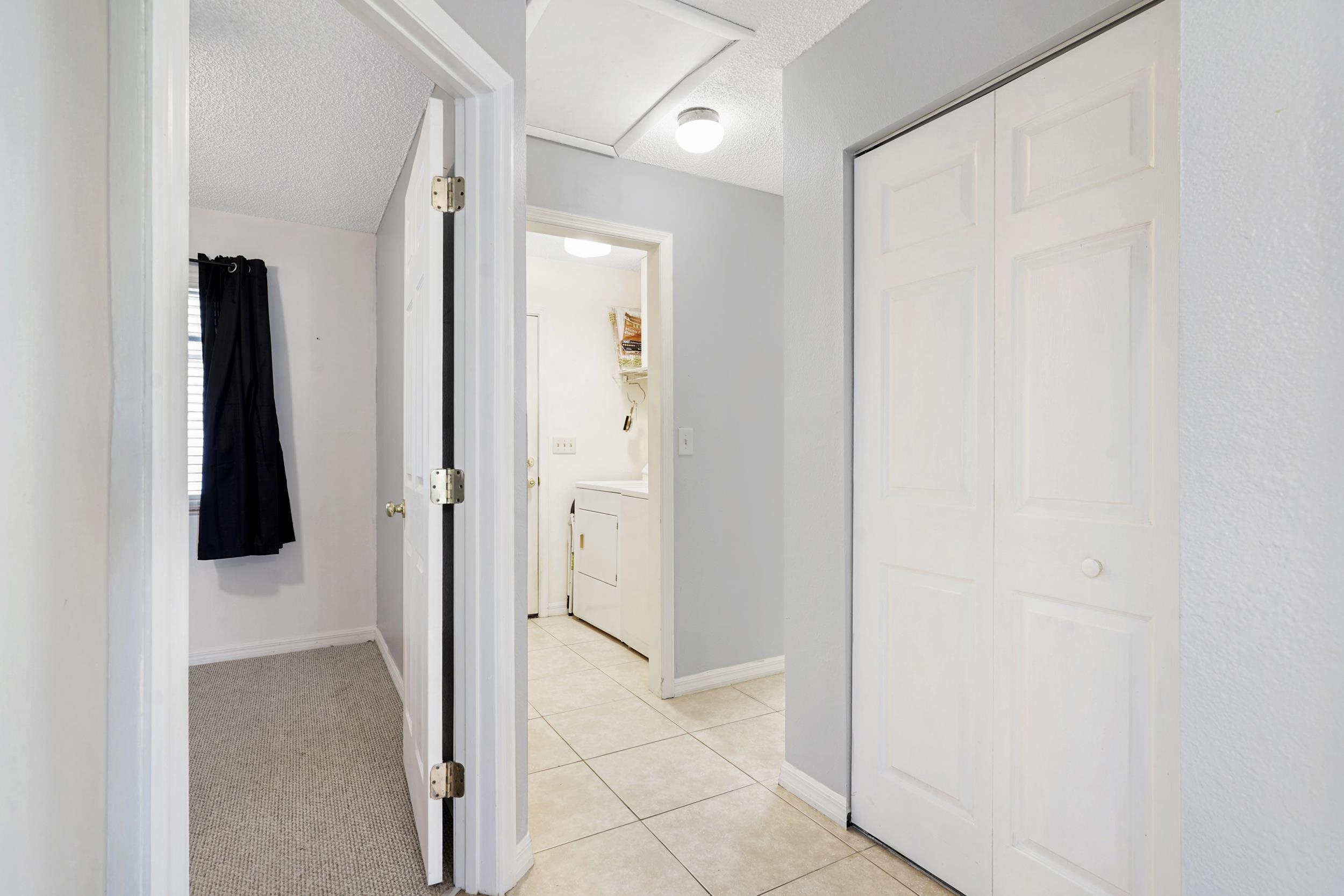 127 Rio Del Mar Street, Unit C St. Augustine, FL 32080 - Photo 14 of 29 a view of a bathroom with a shower and a mirror