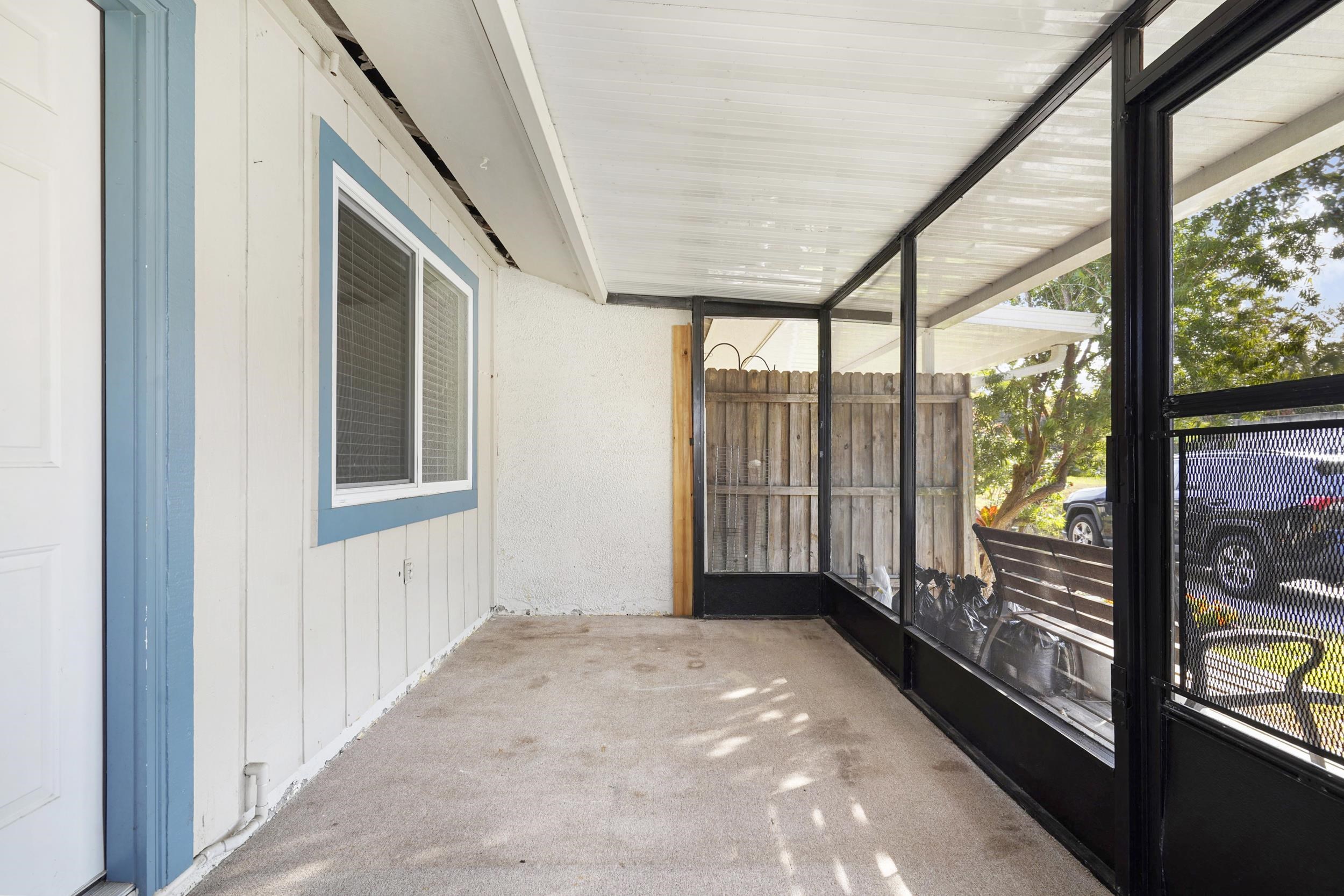 127 Rio Del Mar Street, Unit C St. Augustine, FL 32080 - Photo 22 of 29 View of unfurnished sunroom