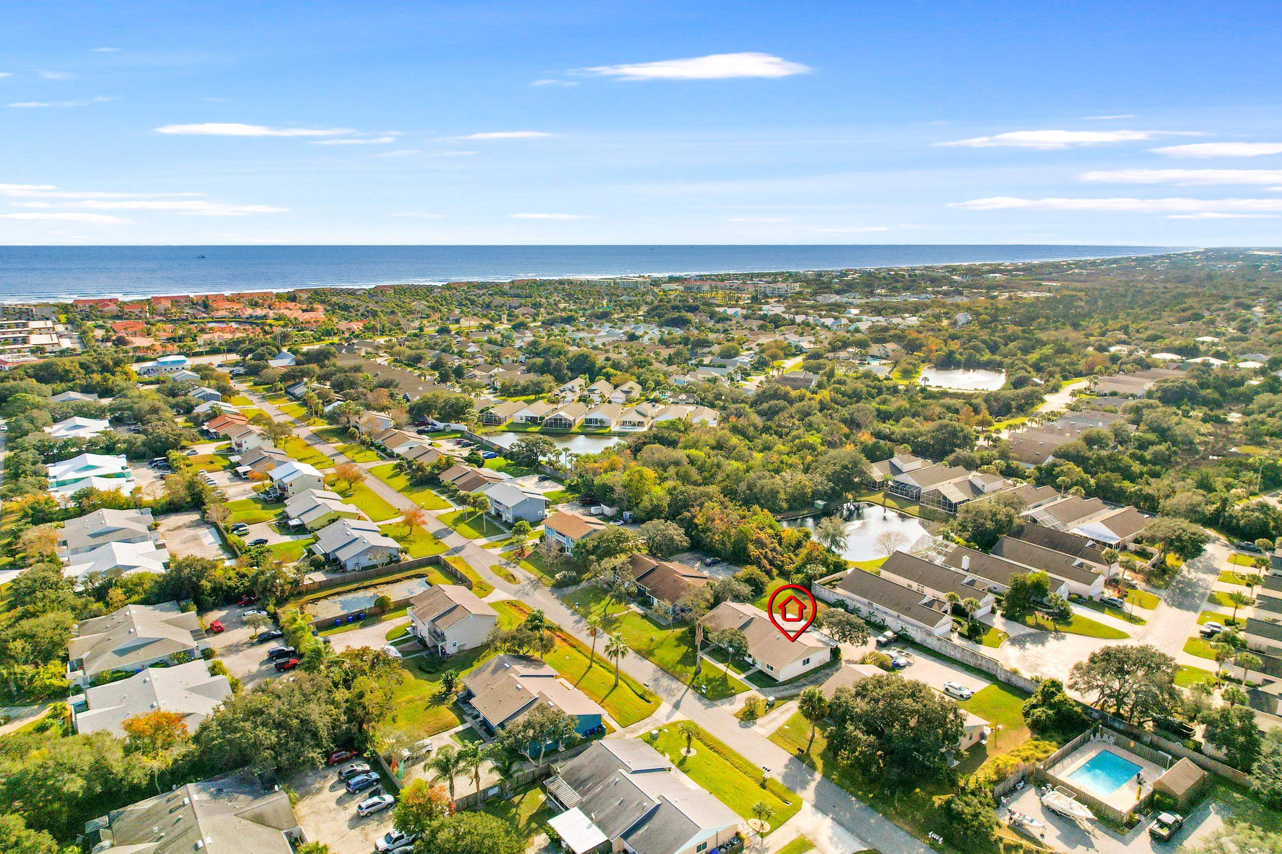 127 Rio Del Mar Street, Unit C St. Augustine, FL 32080 - Photo 27 of 29 Aerial view of property's location with nearby suburban area and a nearby body of water