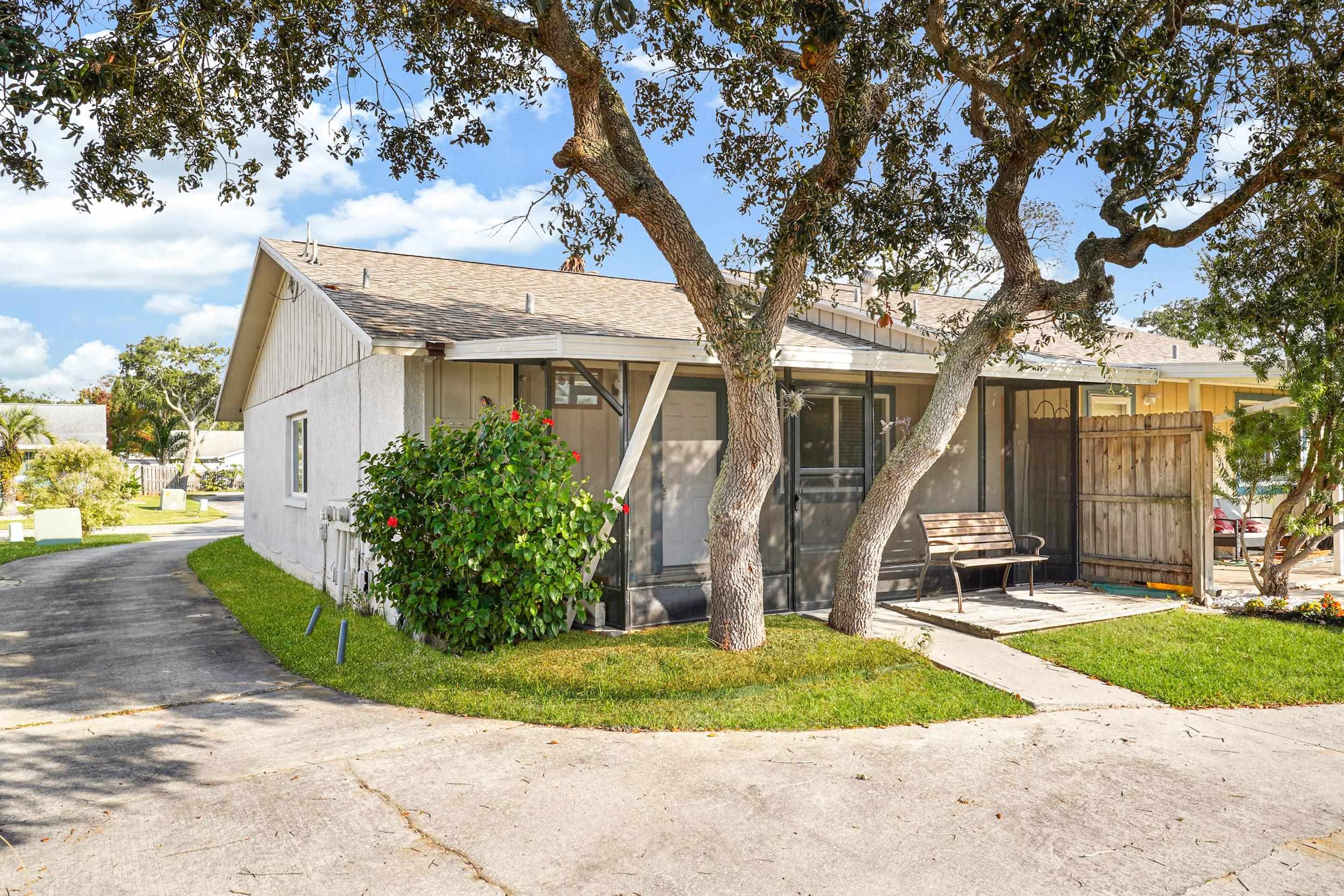 127 Rio Del Mar Street, Unit C St. Augustine, FL 32080 - Photo 3 of 29 View of front facade featuring a shingled roof