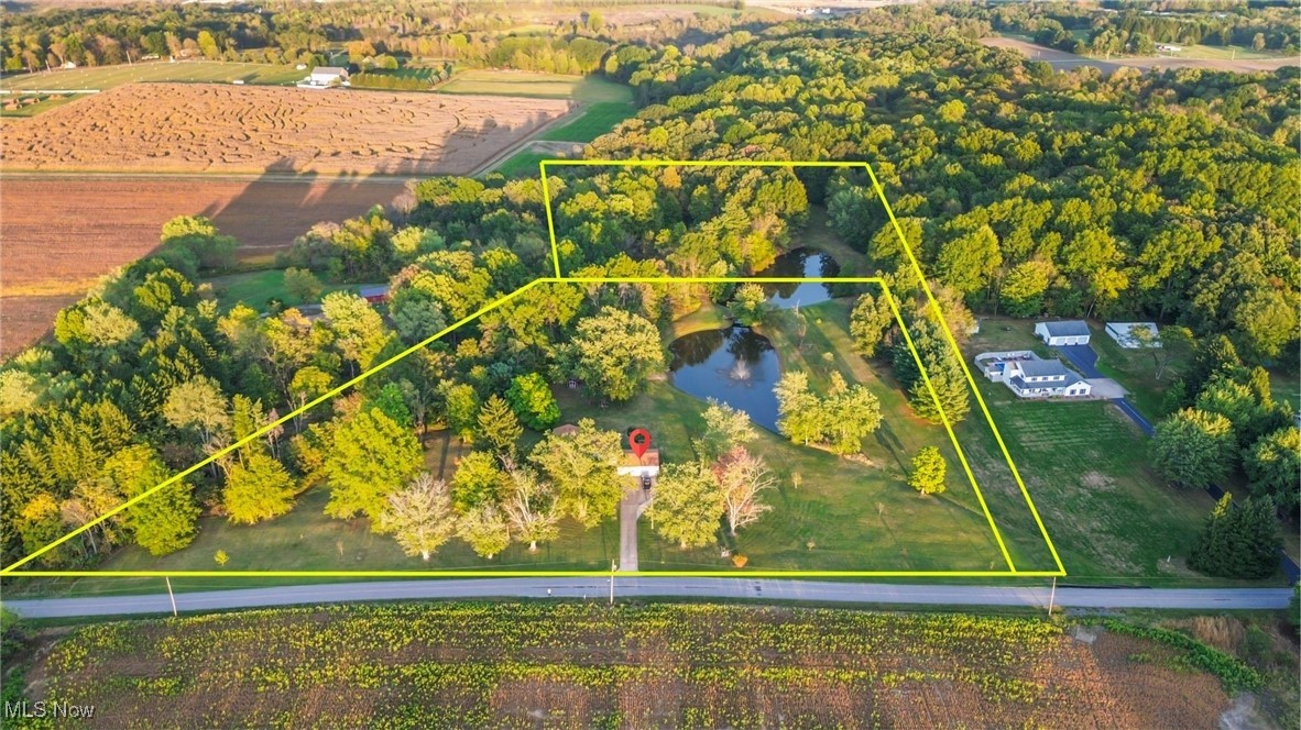 14413 Macklin Road New Springfield, OH 44443 - Photo 3 of 49 Aerial overview of property's location with property boundaries highlighted