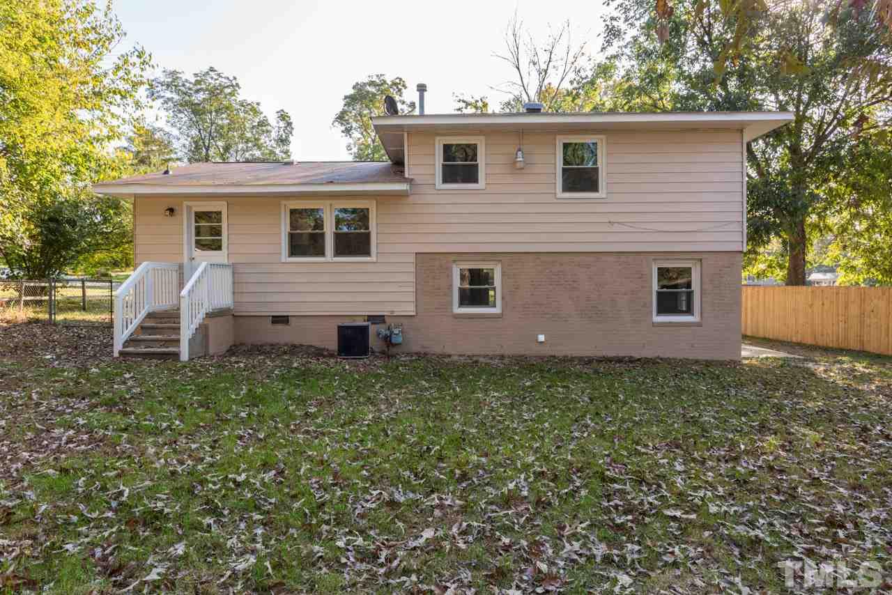 1012 Weston Street Raleigh, NC 27610 - Photo 19 of 23 a view of a house with a yard