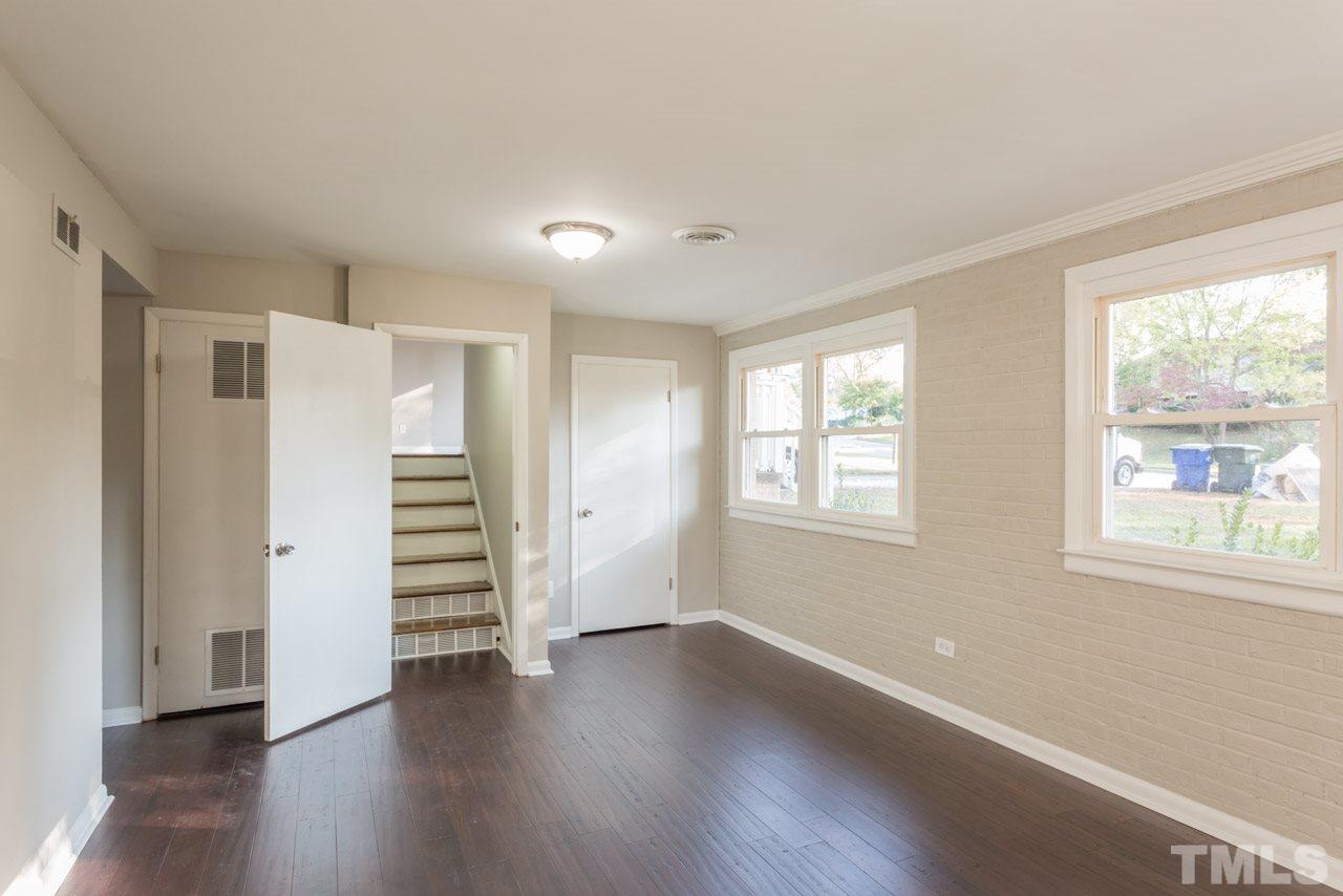 1012 Weston Street Raleigh, NC 27610 - Photo 10 of 23 a view of wooden floor and windows in a room