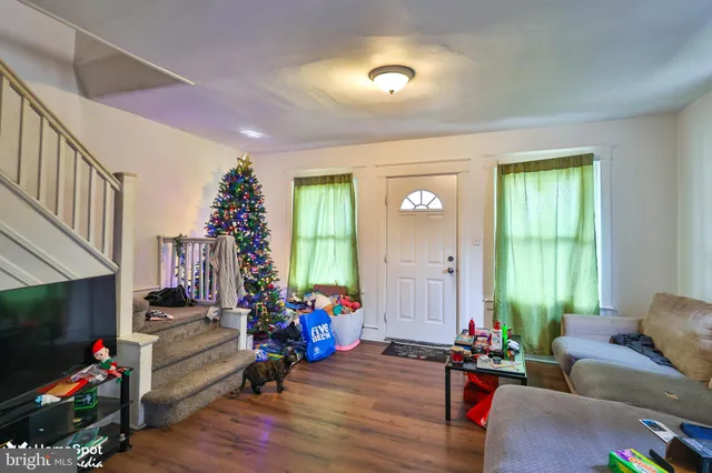 a view of a dining room with furniture and window