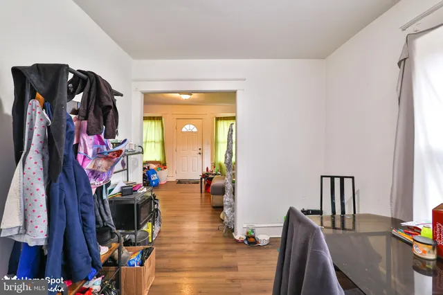 a kitchen with stainless steel appliances a stove a sink and a microwave