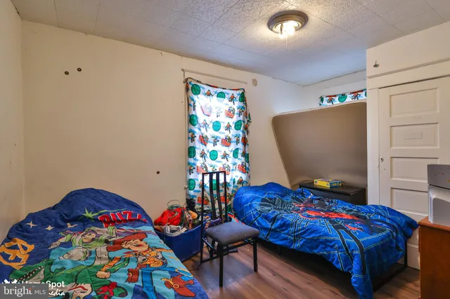 a bathroom with a bath tub and a shower curtain