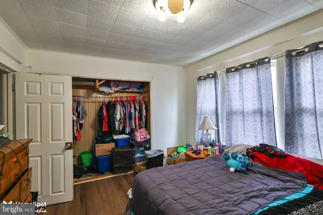 a view of a building with a small yard