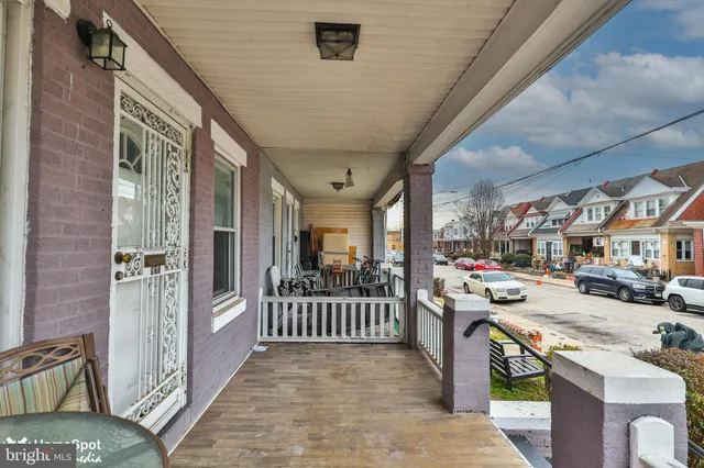 a view of a porch with furniture