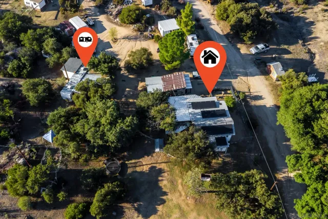 a street sign on a sidewalk next to a road