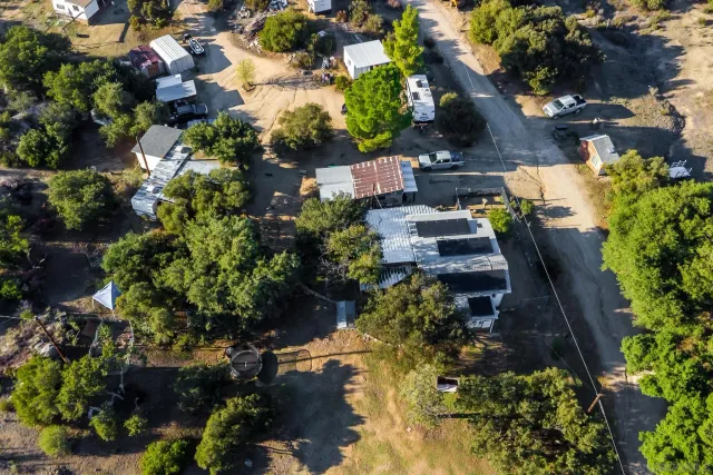 a view of a road with an ocean view