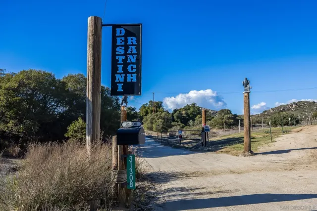a bed room with a bed and a dresser