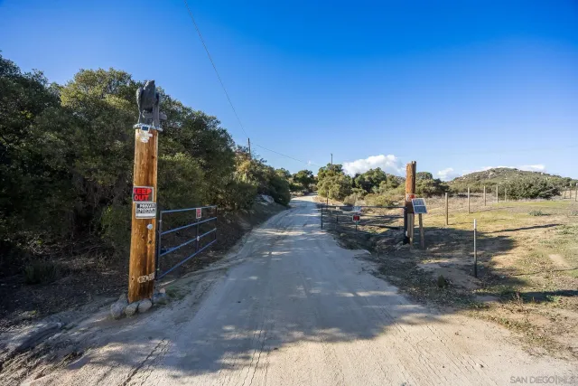 a dining room with wooden floor and outdoor seating