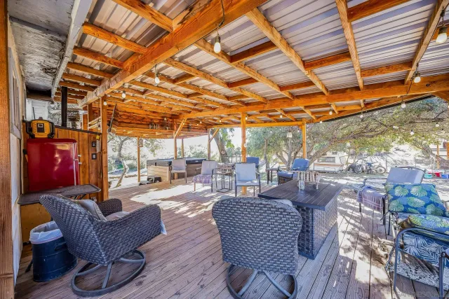 a view of a house with a snow in the background