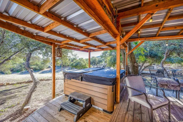 a kitchen with stove and cabinets