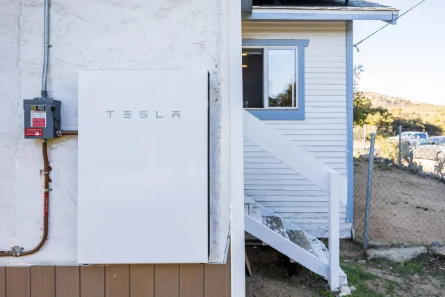 a kitchen with a refrigerator and a sink