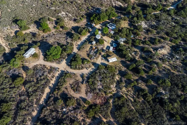 a view of a city with mountains in the background