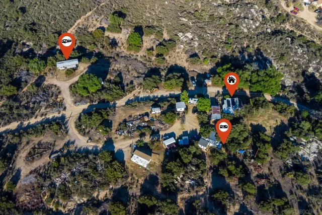 a view of a city with mountains in the background