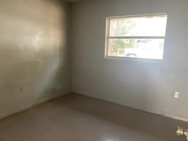 an empty room with a window