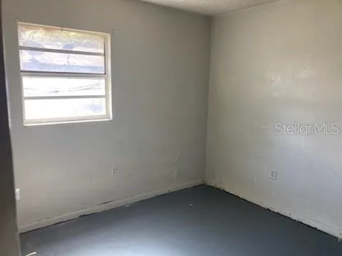 an empty room with a window