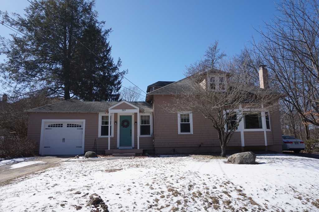 329 Mill Street Lancaster, MA 01523 - Photo 1 of 30 a front view of a house
