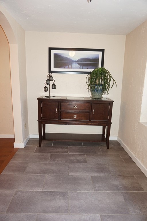 329 Mill Street Lancaster, MA 01523 - Photo 11 of 30 a view of table and chair in room
